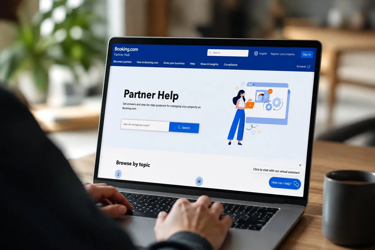 The Booking.com Partner Hub help centre open on a laptop